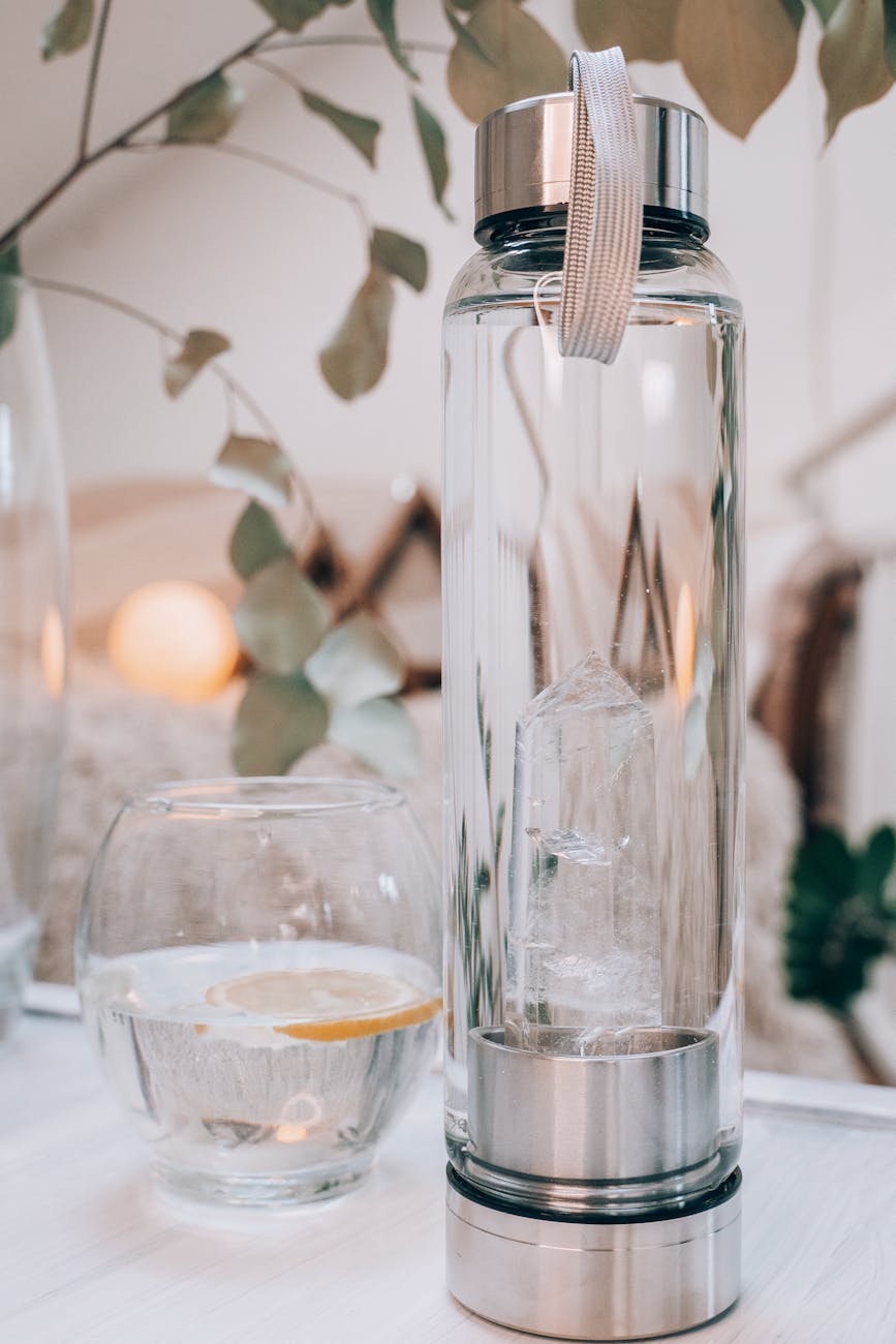 clear glass bottle on white surface